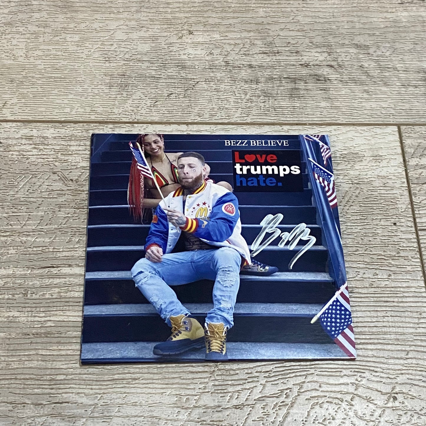 Bezz Believe Love Trumps Hate Autographed Album